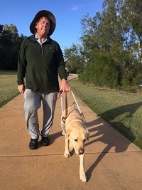Kevin and dog walking at Emerald Lakes